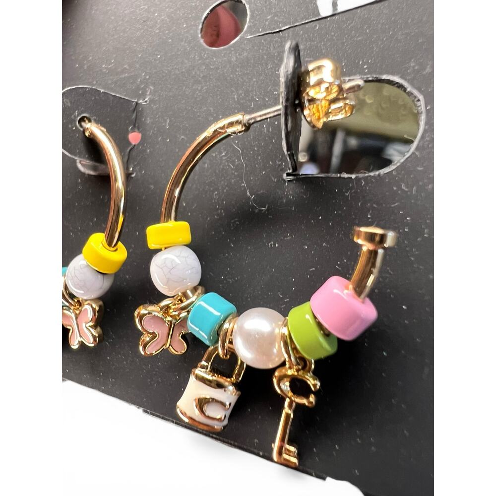 NWT Coach Padlock Multi Charm Huggie Earrings  Gold Beaded Butterfly Key Logo - Picture 4 of 6